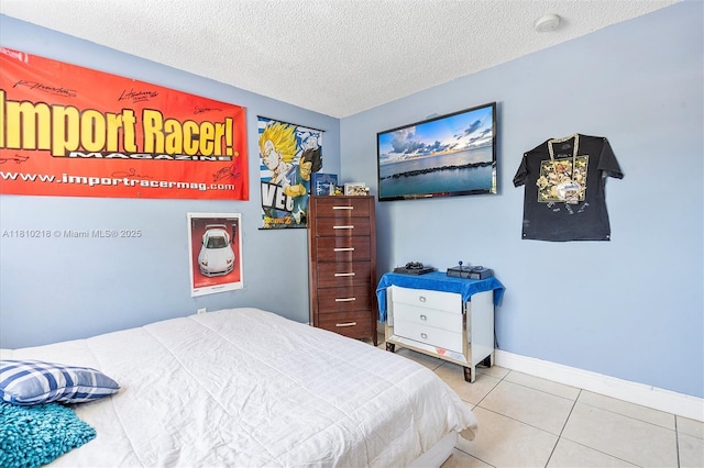 18110 SW 153rd Ct, Miami, FL 33187 - bedroom with tile patterned floors and a textured ceiling