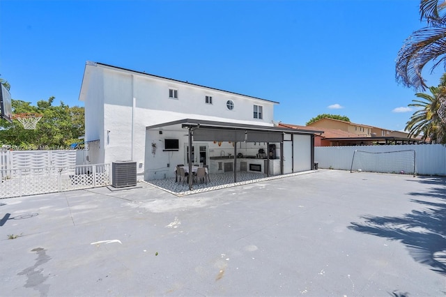 18110 SW 153rd Ct, Miami, FL 33187 - rear view of property with a fenced backyard and stucco siding