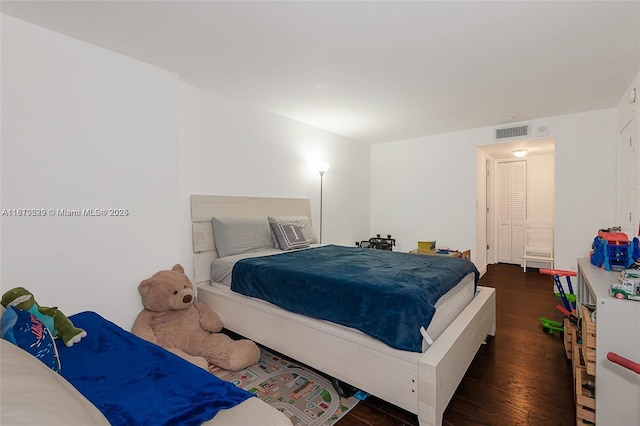 6039 Collins Ave Unit 307, Miami Beach, FL 33140 - bedroom with wood finished floors