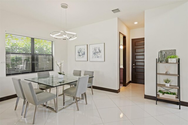 9145 NW 154th Ter, Miami Lakes, FL 33018 - dining area with baseboards, a chandelier, recessed lighting, and light tile patterned floors