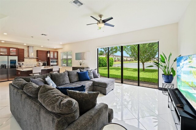 9145 NW 154th Ter, Miami Lakes, FL 33018 - living area with light tile patterned floors, recessed lighting, and ceiling fan