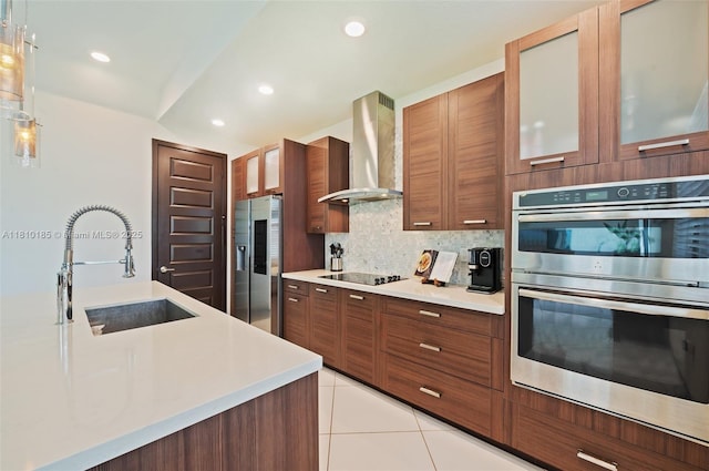 9145 NW 154th Ter, Miami Lakes, FL 33018 - kitchen featuring wall chimney range hood, stainless steel appliances, a sink, modern cabinets, and light countertops