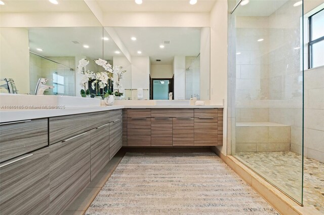 9145 NW 154th Ter, Miami Lakes, FL 33018 - bathroom with tiled shower, vanity, and recessed lighting