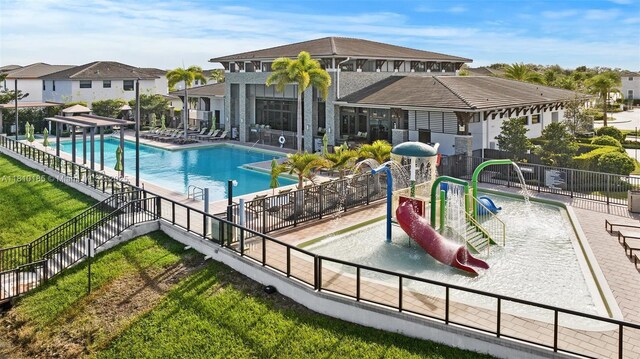 9145 NW 154th Ter, Miami Lakes, FL 33018 - community pool with a water play area