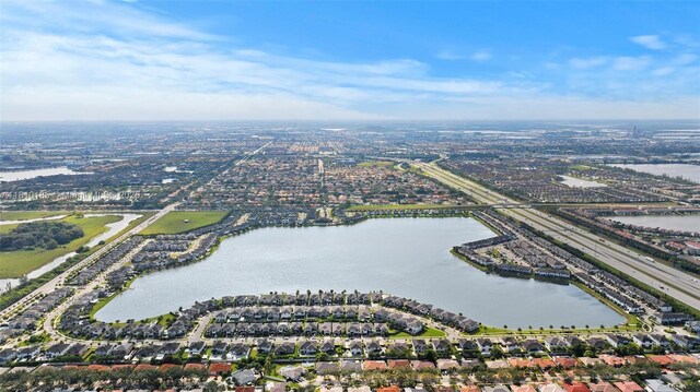 9145 NW 154th Ter, Miami Lakes, FL 33018 - view of property location featuring a nearby body of water, a main thoroughfare, and nearby suburban area