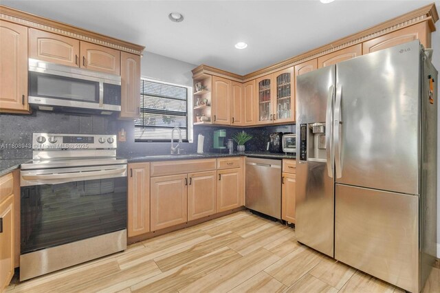 2412 Raleigh St, Hollywood, FL 33020 - kitchen with appliances with stainless steel finishes, a sink, backsplash, recessed lighting, and light brown cabinetry
