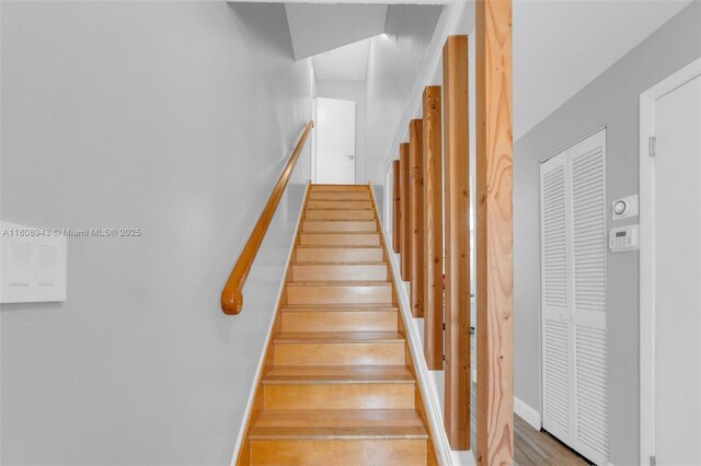 2412 Raleigh St, Hollywood, FL 33020 - stairway with baseboards and wood finished floors