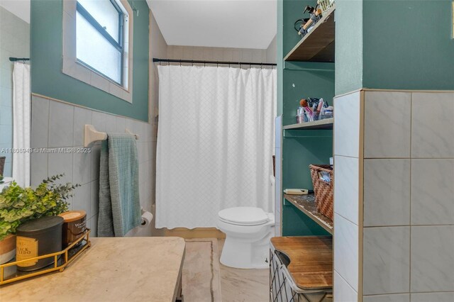 2412 Raleigh St, Hollywood, FL 33020 - full bathroom with toilet, curtained shower, tile walls, and vanity