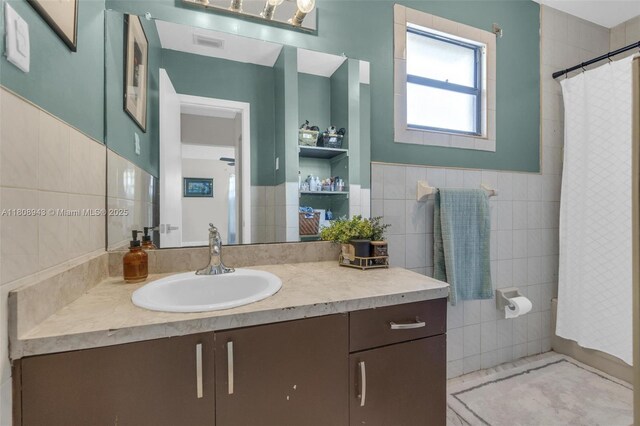 2412 Raleigh St, Hollywood, FL 33020 - full bath with vanity, tile walls, and curtained shower