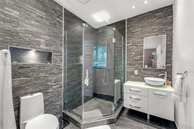 259 E Shore Dr E, Miami, FL 33133 - bathroom with vanity, a stall shower, toilet, recessed lighting, and tile walls