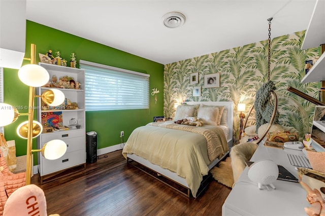 259 E Shore Dr E, Miami, FL 33133 - bedroom with wallpapered walls, an accent wall, dark wood-style flooring, and baseboards