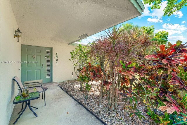 2394 NW 7th Ct, Delray Beach, FL 33445 - view of exterior entry with stucco siding
