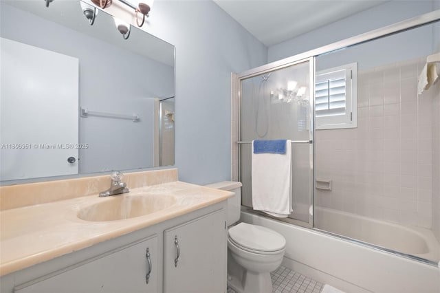 2394 NW 7th Ct, Delray Beach, FL 33445 - full bathroom with vanity, toilet, enclosed tub / shower combo, and tile patterned floors