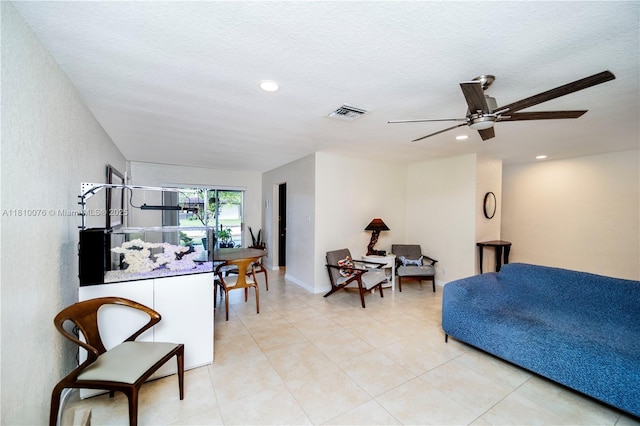 5710 NW 73rd Ave, Tamarac, FL 33321 - living room with a ceiling fan, recessed lighting, light tile patterned floors, and a textured ceiling