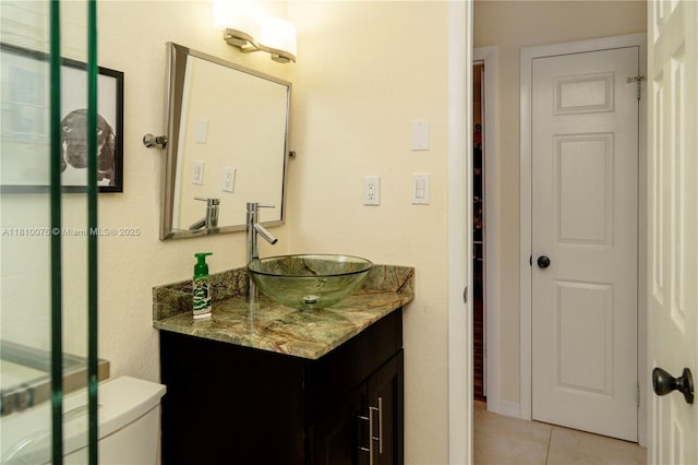 5710 NW 73rd Ave, Tamarac, FL 33321 - bathroom with vanity, tile patterned flooring, and toilet