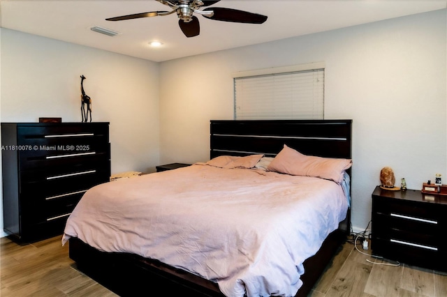 5710 NW 73rd Ave, Tamarac, FL 33321 - bedroom featuring wood finished floors and a ceiling fan