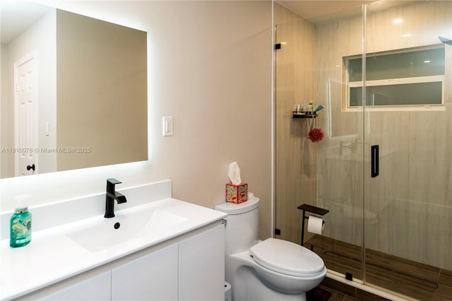 5710 NW 73rd Ave, Tamarac, FL 33321 - bathroom with vanity, toilet, and a shower stall