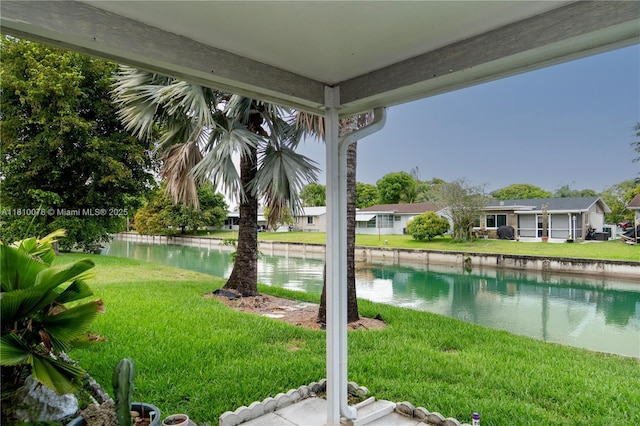 5710 NW 73rd Ave, Tamarac, FL 33321 - view of green lawn with a water view