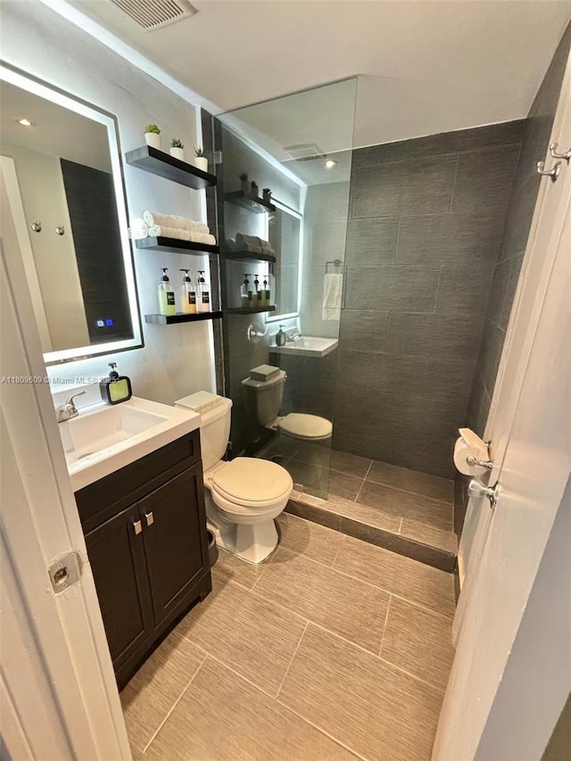 750 Collins Ave Unit 206, Miami Beach, FL 33139 - full bath with toilet, vanity, and a walk in shower