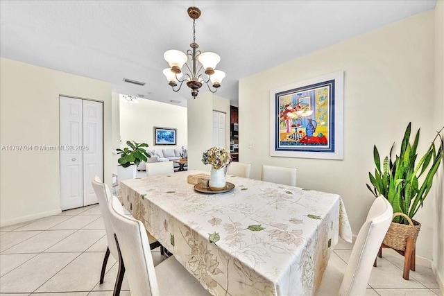 18018 SW 30th Ct, Miramar, FL 33029 - dining area featuring a chandelier and light tile patterned floors