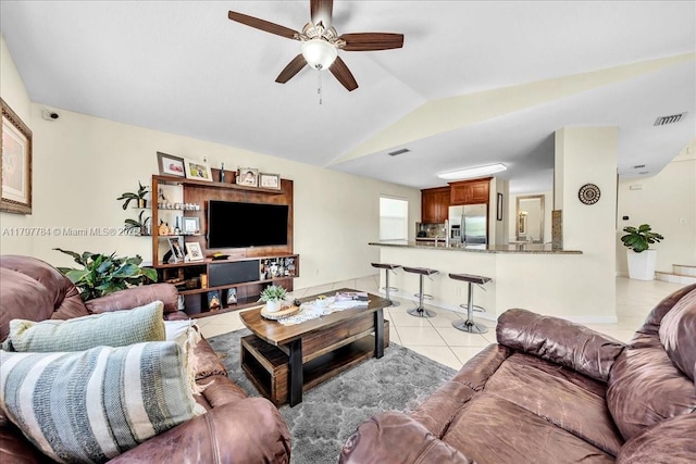 18018 SW 30th Ct, Miramar, FL 33029 - living area with light tile patterned flooring, a ceiling fan, and lofted ceiling