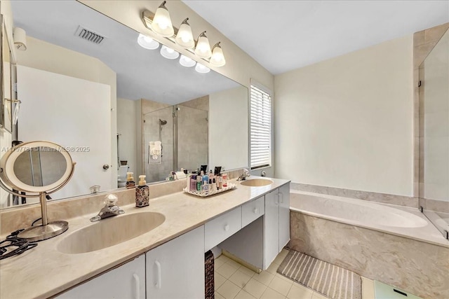 18018 SW 30th Ct, Miramar, FL 33029 - bathroom featuring a bath, a shower stall, tile patterned flooring, and double vanity