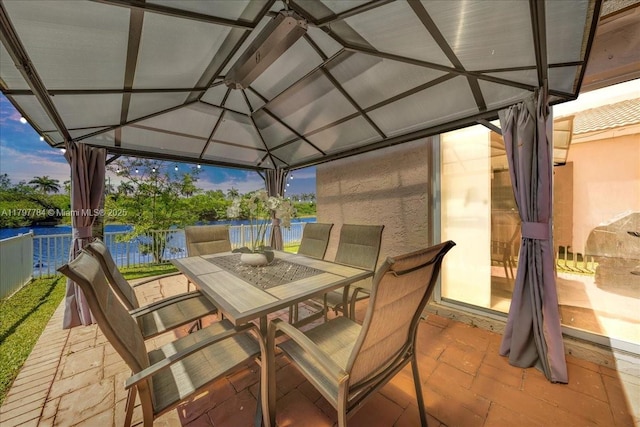 18018 SW 30th Ct, Miramar, FL 33029 - view of patio with a gazebo, a water view, and outdoor dining space