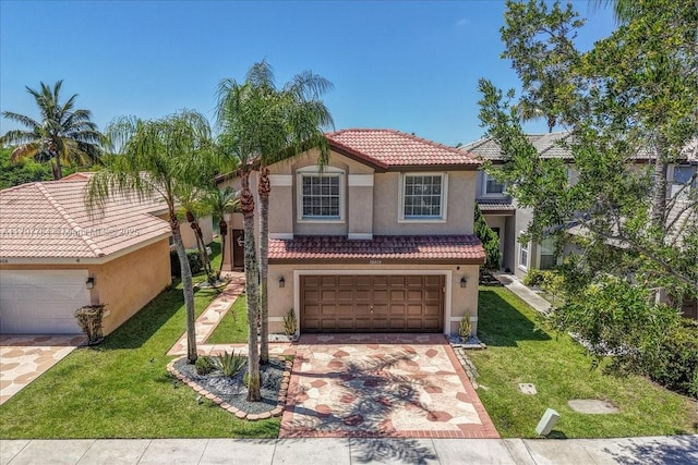 18018 SW 30th Ct, Miramar, FL 33029 - mediterranean / spanish home featuring stucco siding, a tiled roof, a front yard, a garage, and driveway