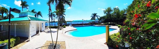 18018 SW 30th Ct, Miramar, FL 33029 - community pool featuring a patio