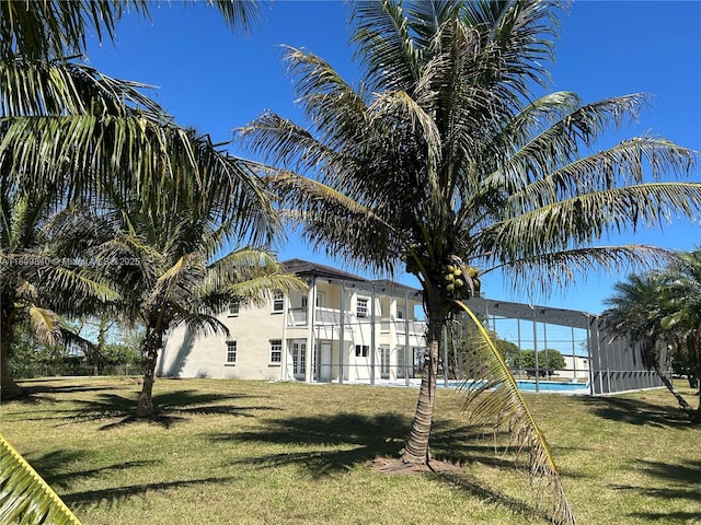 14300 SW 177th Ave, Miami, FL 33196 - view of green lawn featuring a balcony