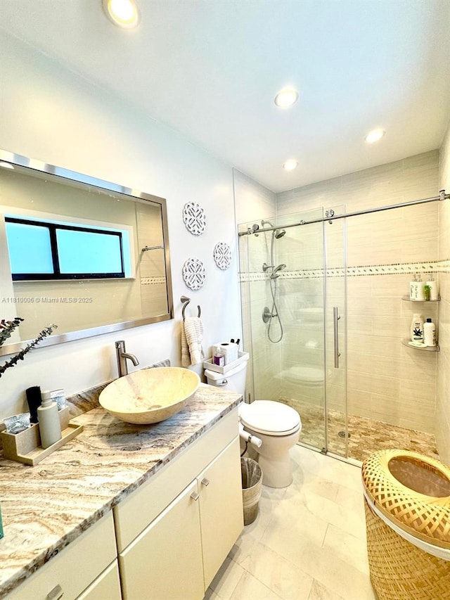 18830 NW 65th Ct, Hialeah, FL 33015 - bathroom featuring toilet, a stall shower, vanity, and recessed lighting