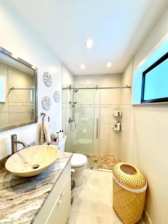 18830 NW 65th Ct, Hialeah, FL 33015 - full bathroom featuring a shower stall, toilet, vanity, and recessed lighting