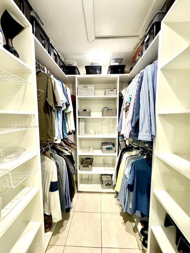 18830 NW 65th Ct, Hialeah, FL 33015 - walk in closet with attic access and tile patterned flooring