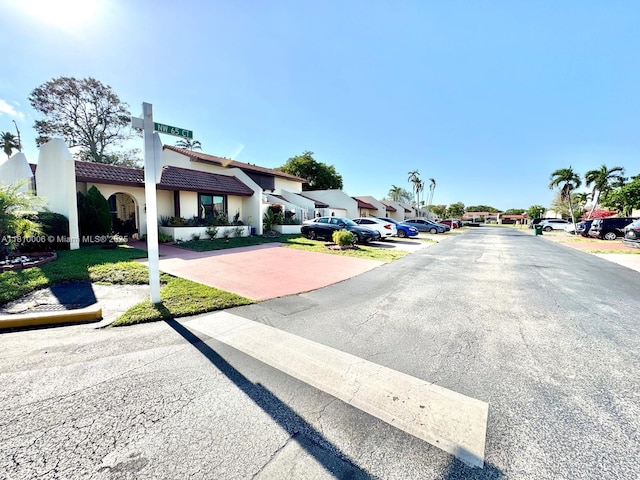 18830 NW 65th Ct, Hialeah, FL 33015 - view of asphalt road featuring a residential view
