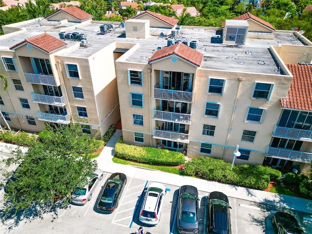 529 E Sheridan St Unit 206, Dania Beach, FL 33004 - view of apartment building / complex featuring uncovered parking