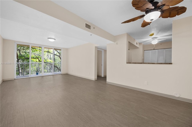 529 E Sheridan St Unit 206, Dania Beach, FL 33004 - unfurnished room with baseboards, ceiling fan, and wood finished floors