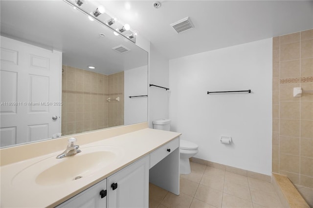 529 E Sheridan St Unit 206, Dania Beach, FL 33004 - full bath featuring vanity, toilet, tile patterned floors, tiled shower, and baseboards