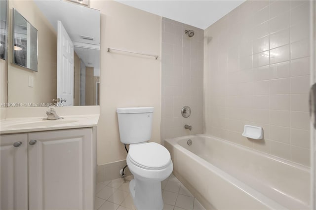 529 E Sheridan St Unit 206, Dania Beach, FL 33004 - bathroom with tile patterned floors, toilet, vanity, washtub / shower combination, and baseboards