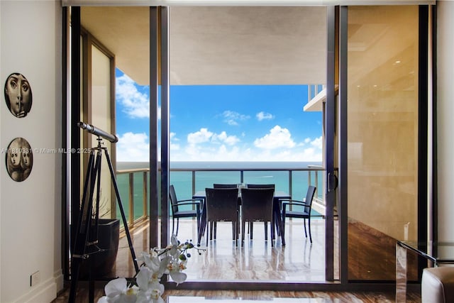 9703 Collins Ave Unit 2615, Bal Harbour, FL 33154 - dining area with a water view, baseboards, and floor to ceiling windows