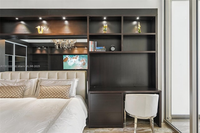 9703 Collins Ave Unit 2615, Bal Harbour, FL 33154 - bedroom with a chandelier