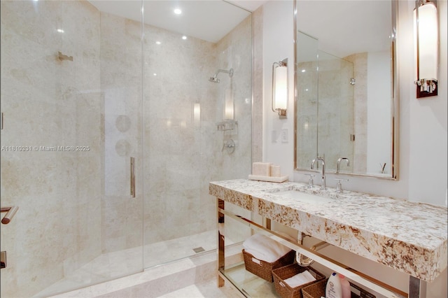 9703 Collins Ave Unit 2615, Bal Harbour, FL 33154 - bathroom featuring a stall shower and vanity