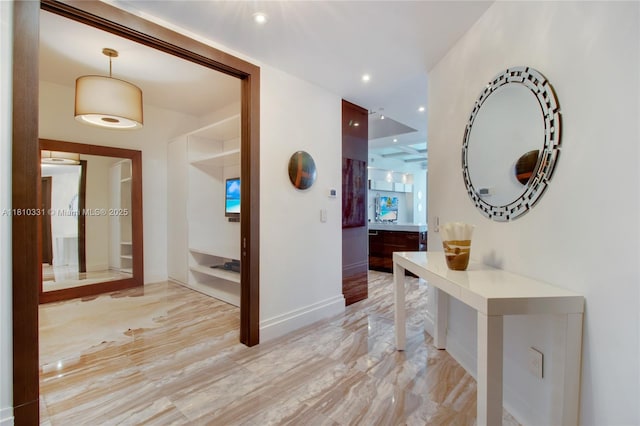 9703 Collins Ave Unit 2615, Bal Harbour, FL 33154 - hall with light marble finish flooring, baseboards, and recessed lighting