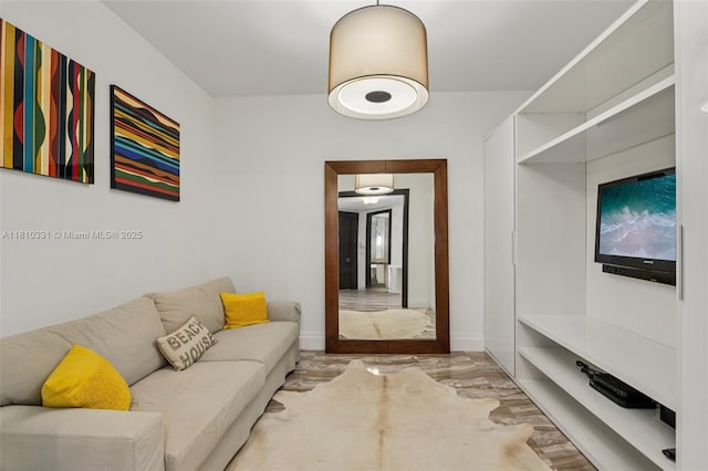 9703 Collins Ave Unit 2615, Bal Harbour, FL 33154 - living room with baseboards