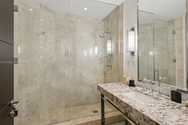 9703 Collins Ave Unit 2615, Bal Harbour, FL 33154 - bathroom featuring a shower stall and vanity