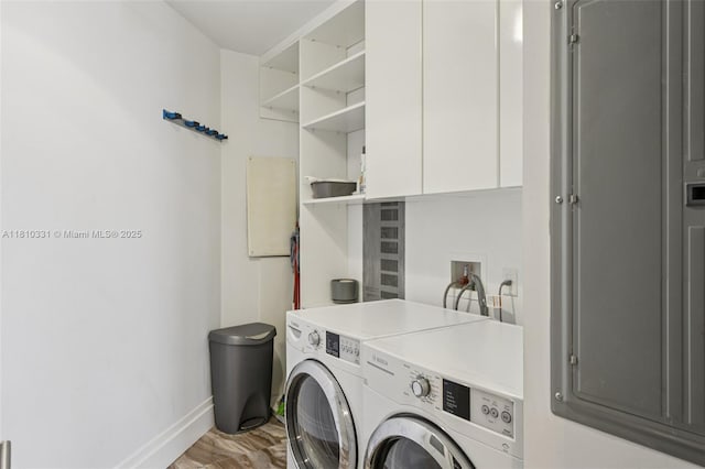 9703 Collins Ave Unit 2615, Bal Harbour, FL 33154 - laundry area featuring washer and clothes dryer and cabinet space