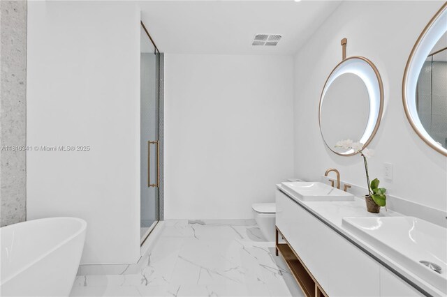 2655 S Bayshore Dr Unit 705, Miami, FL 33133 - full bath with double vanity, marble look tiles, a stall shower, a freestanding tub, and baseboards