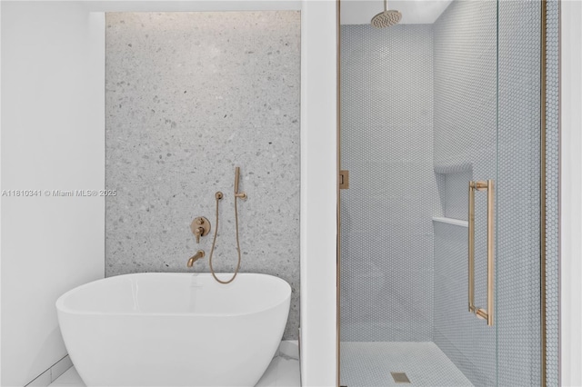 2655 S Bayshore Dr Unit 705, Miami, FL 33133 - bathroom with a freestanding bath and a stall shower