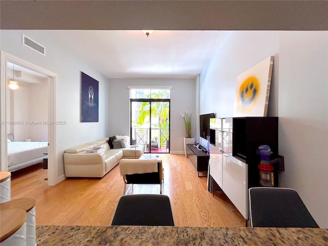 1805 Ponce De Leon Blvd Unit 626, Coral Gables, FL 33134 - living room with wood finished floors and baseboards