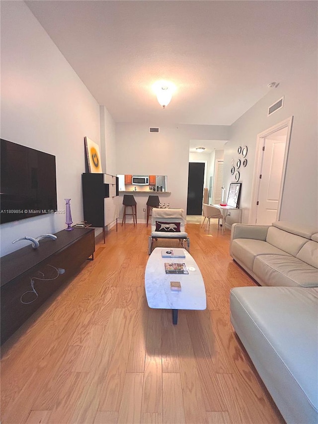 1805 Ponce De Leon Blvd Unit 626, Coral Gables, FL 33134 - living area with light wood finished floors