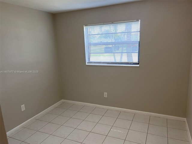 2391 NW 63rd Ter, Sunrise, FL 33313 - unfurnished room featuring baseboards and light tile patterned floors